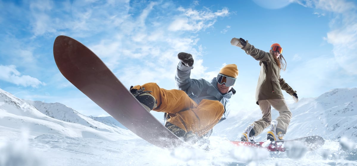 Snowboarding riders in action.